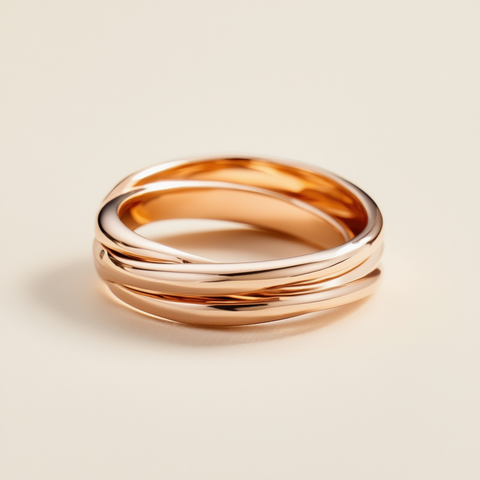 Rose gold ring on a beige background