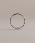 Silver ring on a beige background